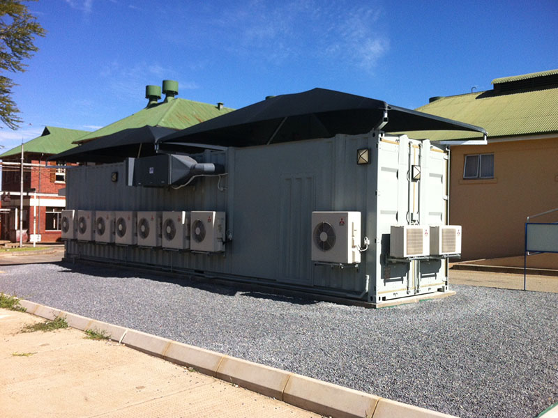 biosafety-laboratory-modular-structure-ac-exterior-view-lislabs External view of modular lab structure fitted with numerous AC units, indicating BSL-2+ capability.